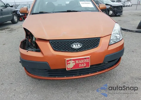 2009 Kia Rio Lx from USA, damaged, VIN KNADE223396462940